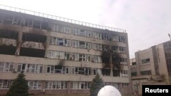 A view of a damaged building at the Zaporizhzhia Nuclear Power Plant compound in Enerhodar