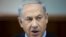 Israeli Prime Minister Benjamin Netanyahu attends the weekly cabinet meeting at his office in Jerusalem, Nov. 24, 2013. 
