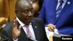 President Cyril Ramaphosa takes an oath as he is sworn in as a Member of Parliament in Cape Town, South Africa, May 22, 2019.