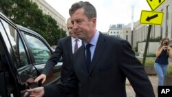 FILE - W. Samuel Patten leaves the federal court in Washington, Aug. 31, 2018. 