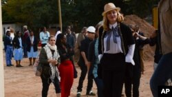 US performer Madonna visits the pediatric surgery and Malawi's first ever intensive care unit at Queen Elizabeth Central Hospital in the southern city of Blantyre, July 10, 2016. 