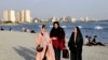  Some Iranian Women Take Off Hijabs As Hard-Liners Push Back