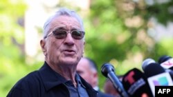 US actor Robert De Niro speaks in support of US President Joe Biden outside of Manhattan Criminal Court as former US President and Republican presidential candidate Donald Trump attends his criminal trial for allegedly covering up hush money payments in New York City, on May 28, 2024..(Photo by Charly TRIBALLEAU / AFP)