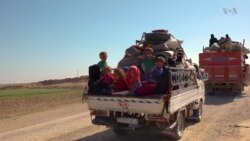 US-backed Syrian Forces Open Corridor for Fleeing Raqqa Residents