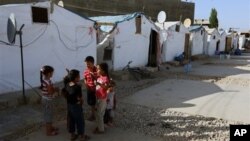 Syrian children at refugee camp in the eastern town of Marj, Bekaa valley, Lebanon, June 29, 2014.