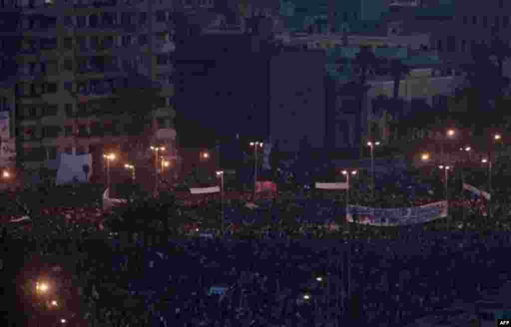 A crowd remains late afternoon in Tahrir, or Liberation, Square in Cairo, Egypt, Tuesday, Feb. 1, 2011. More than a quarter-million people flooded into the heart of Cairo Tuesday, filling the city's main square in by far the largest demonstration in a wee