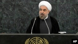 File - Iranian President Hassan Rouhani addresses a high-level meeting on Nuclear Disarmament during the 68th United Nations General Assembly, Sept. 26, 2013. 