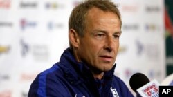 U.S. men's national soccer team coach Jurgen Klinsmann, who has been “relieved of his duties” as coach and technical director, takes part in a news conference in St. Louis, Nov. 12, 2015.