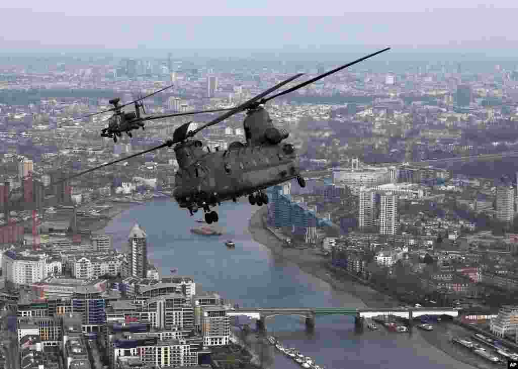 A Royal Air Force Chinook flies over London during the Service of Commemoration &ndash; Afghanistan at St. Paul&#39;s Cathedral in London. The Queen and Britain&#39;s prime minister joined veterans in a service to commemorate the end of Britain&#39;s combat operations in Afghanistan. Almost 150,000 Britons served in the conflict, and 453 died.