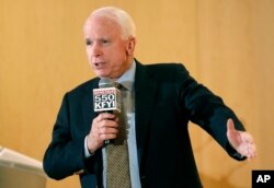 Sen. John McCain speaks during a forum with veterans in Phoenix, Arizona, May 9, 2014.