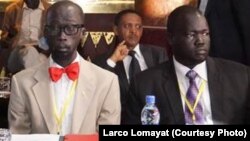 Opposition negotiator Hussein Mar Nyuot (R), shown here with Mabior de Garang (L) at the first round of peace talks for South Sudan in Addis Ababa in January, says the warring sides have agreed to a "month of tranquility" starting May 7. 