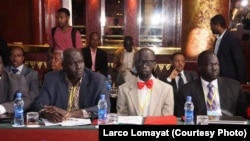 Opposition negotiators Hussein Mar Nyuot (L), and Mabior de Garang (C) at peace talks for South Sudan in Addis Ababa. 