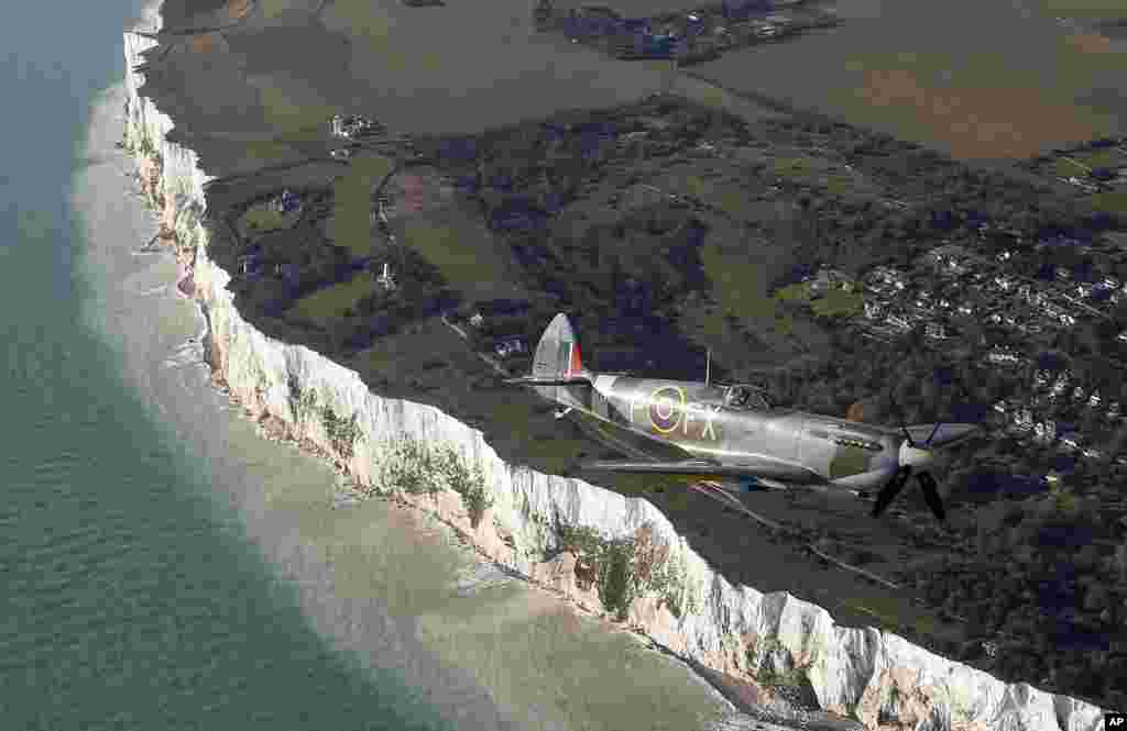World War II Supermarine Spitfire fighter performs a flyover over White Cliffs of Dover during Remembrance Sunday celebrations in Dover, Britain.