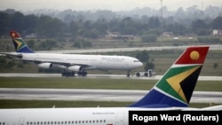 Des avions de la compagnie aérienne South African Airways à l'aéroport international O.R. Tambo de Johannesburg, le 18 janvier 2020. (Photo: REUTERS/Rogan Ward)