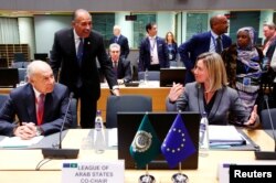 Arab League Secretary-General Ahmed Abul Gheit and EU foreign policy chief Federica Mogherini attend a joint meeting of European Union and League of Arab States foreign ministers in Brussels, Belgium, Feb. 4, 2019.