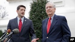 FILE - House Speaker Paul Ryan of Wisconsin, right, and Senate Majority Leader Mitch McConnell of Kentucky meet with reporters outside the White House in Washington after meeting with President Donald Trump.