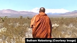 Buddhist monk Sutham Nateetong is walking across the USA to promote peace