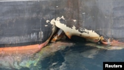 A damaged Andea Victory ship is seen off the Port of Fujairah, United Arab Emirates, May 13, 2019.