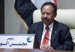 FILE - Sudan's Prime Minister Abdalla Hamdok chairs an emergency Cabinet session in the capital Khartoum,Oct 18, 2021.