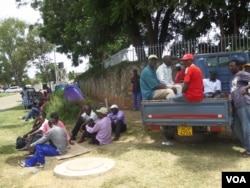 The camping former GMB workers claim that they have been locked out of the GMB premises. (Photo: Patricia Mudadigwa)