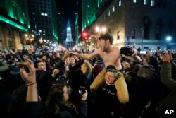 Philadelphia Eagles fans celebrate the team's victory in the NFL Super Bowl 52