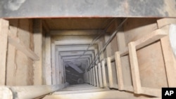The exit of the tunnel that according to authorities was used by Mexican drug lord Joaquin "El Chapo" Guzman, to escape from the Altiplano maximum security prison is seen in Almoloya, Mexico, July 14, 2015. 