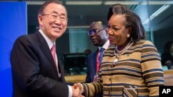 United Nations Secretary General Ban Ki-moon, left, greets Central African Republic President Catherine Samba-Panza as he arrives for a meeting on Central African Republic prior to the EU Africa summit at the EU Council building in Brussels, April 2, 2014.