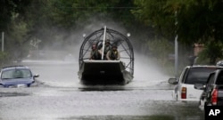 A U.S. Border Patrol air boat moves through neighborhood inundated by floodwaters from Tropical Storm Harvey in Houston, Texas, Aug. 30, 2017. John Morris, the Border Patrol’s chief of staff in South Texas, said the agency had 35 boats in the city’s flooded neighborhoods on Aug. 31, 2017, and had rescued about 450 people since Monday.