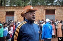 FILE - Burundi's President Pierre Nkurunziza speaks to the media after casting his vote in the constitutional referendum in Buye, north of Ngozi, in northern Burundi, May 17, 2018.