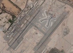 FILE - Abu Dhabi International Airport is seen Dec. 8, 2021. A suspected drone attack by Yemen's Houthi rebels targeting a key oil facility in Abu Dhabi killed three people and sparked a separate fire at Abu Dhabi's international airport on Jan. 17, 2022.