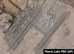 FILE - Abu Dhabi International Airport is seen Dec. 8, 2021. A suspected drone attack by Yemen's Houthi rebels targeting a key oil facility in Abu Dhabi killed three people and sparked a separate fire at Abu Dhabi's international airport on Jan. 17, 2022.