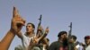 Libyan NTC Fighters Pause in Battle for Key Town