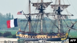 A replica of the French navy frigate L'Hermione, which played a key role in the American Revolution, sets sail on its maiden voyage to the United States from Fouras, southwestern France, April 18, 2015. 