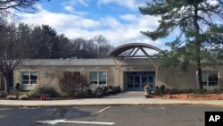 The Ox Ridge Elementary School is seen in Darien, Conn., Nov. 27, 2018. The Darien school system said parents are no longer welcome to have lunch with their children at the town's elementary schools.