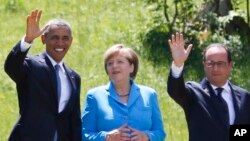 Barack Obama, Angela Merkel et François Hollande au somment du G7 à Schloss Elmau près de Garmisch-Partenkirchen, en Allemagne, le 7 juin 2015.(AP Photo/Markus Schreiber)