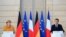 French President Emmanuel Macron and German Chancellor Angela Merkel attend a joint news conference at the Elysee Palace in Paris, France, Feb. 27, 2019. 