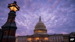 FILE - The U.S. Capitol building is seen as dawn in Washington, Oct. 3, 2019.