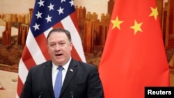 El secretario Pompeo durante la cumbre mantenida por Estados Unidos y China en Beijing, el 14 de junio de 2018.