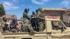Pendukung perlawanan rakyat bersenjata Sudan, yang mendukung tentara Sudan, berada di atas truk di Gedaref di Sudan timur pada 3 Maret 2024, di tengah konflik antara tentara dan paramiliter. (Foto: AFP)