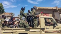 (FILES) Supporters of the Sudanese armed popular resistance, which backs Sudan's army, ride on trucks in Gedaref in eastern Sudan on March 3, 2024, amid the ongoing conflict in the country between the army and paramilitaries.