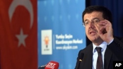 FILE - Turkish Economy Minister Nihat Zeybekci, pictured in Cologne, Germany, in March 2017, said in a statement June 21, 2018, that Turkey would not allow itself "to be wrongly blamed for America's economic challenges."