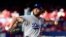 FILE - Los Angeles Dodgers starting pitcher Clayton Kershaw throws a pitch against the St. Louis Cardinals.