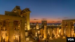 Local officials say the number of tourists doubled at Luxor Temple on the day after the Avenue of the Sphinxes reopened on Nov. 26, 2021. 