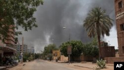 Smoke is seen rising in Khartoum, Sudan, Saturday, April 15, 2023. Fierce clashes between Sudan's military and the country's powerful paramilitary erupted in the capital and elsewhere in the African nation after weeks of escalating tensions between the two forces.