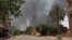 Smoke is seen rising in Khartoum, Sudan, Saturday, April 15, 2023. Fierce clashes between Sudan's military and the country's powerful paramilitary erupted in the capital and elsewhere in the African nation after weeks of escalating tensions between the two forces.