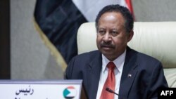 FILE - Sudan's Prime Minister Abdalla Hamdok chairs an emergency cabinet session in the capital Khartoum,Oct 18, 2021. 