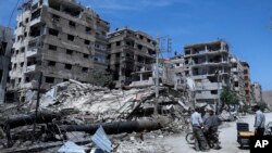 Un edificio dañado en Duma, la ciudad siria donde se sospecha que el gobierno sirio lanzó un ataque con gas cloro que es investigado por la Organización de la ONU para la Prohibición de armas químicas. Foto de abril 16 de 2018.