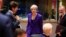 British Prime Minister Theresa May, center, arrives for a round table meeting at an EU summit in Brussels, Oct. 18, 2018.