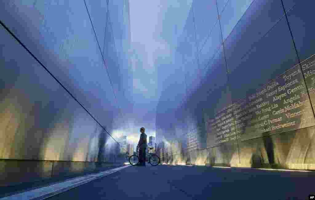 Tamir Rivera, of Newark, pauses to look at the names on the &quot;Empty Sky&quot; memorial to New Jersey&#39;s victims of the Sept. 11, 2001 terrorist attacks, in Jersey City, New Jersey.