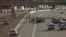 FILE - Traffic backs up on Interstate Highway 10 as authorities investigate a fatal accident in Phoenix, July 26, 2015. Drivers who miss two or three hours of sleep in a day face the same risk of an accident as those who are legally drunk, an AAA study found.